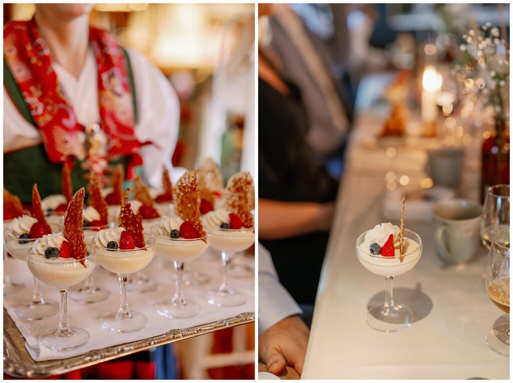 Traditionellt serverad dessert under bröllopsmiddagen på Green Hotel i Tällberg, presenterad av personal i folkdräkt och dukad i mjukt kvällsljus. Detaljbild från ett bröllop i Dalarna fotograferat av bröllopsfotograf Dalarna. Traditional dessert served during the wedding dinner at Green Hotel in Tällberg, presented by staff in folk costume and set in soft evening light. Detail from a wedding in Dalarna photographed by a wedding photographer in Dalarna.